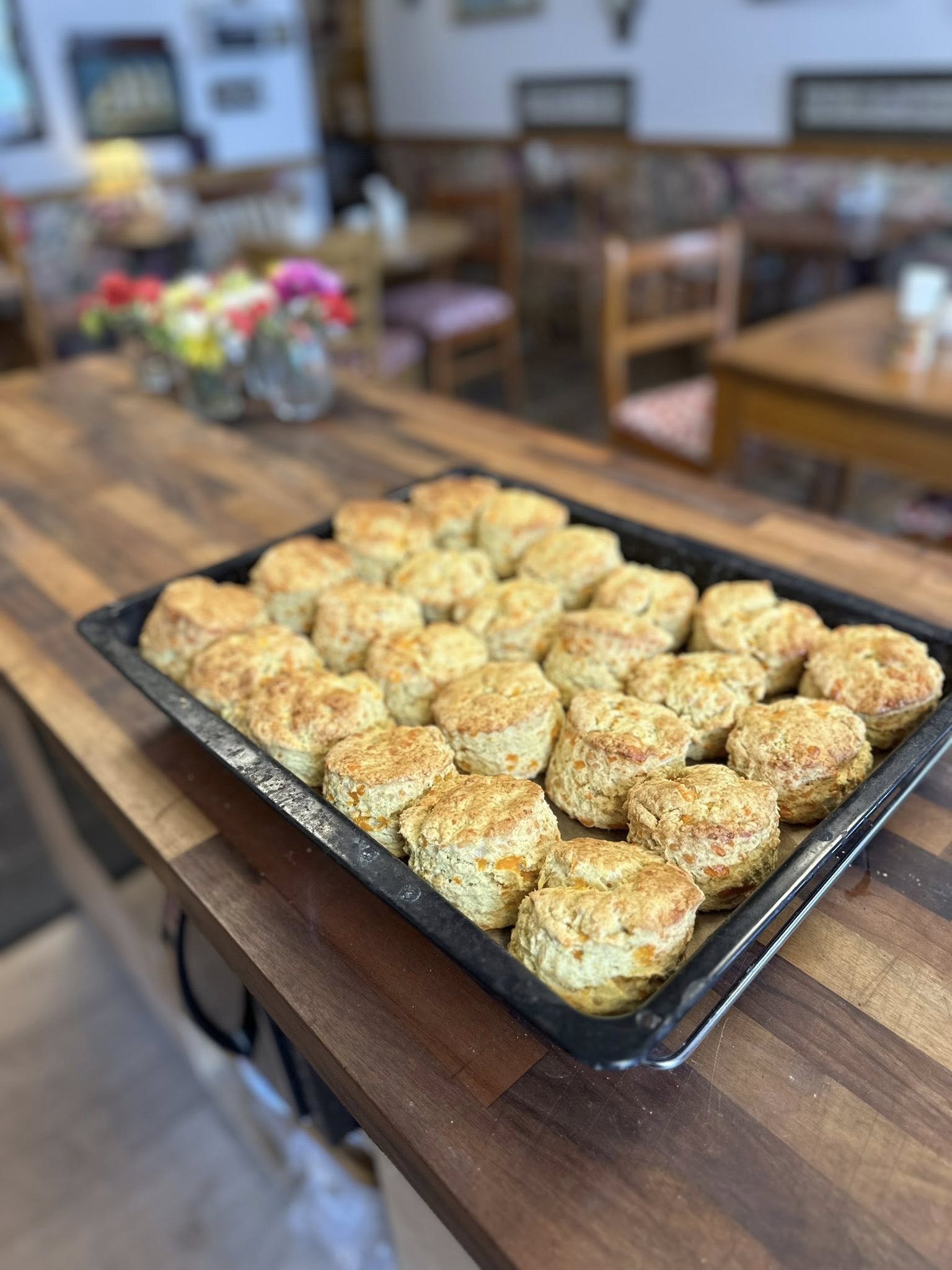 Freshly baked scones on a tray