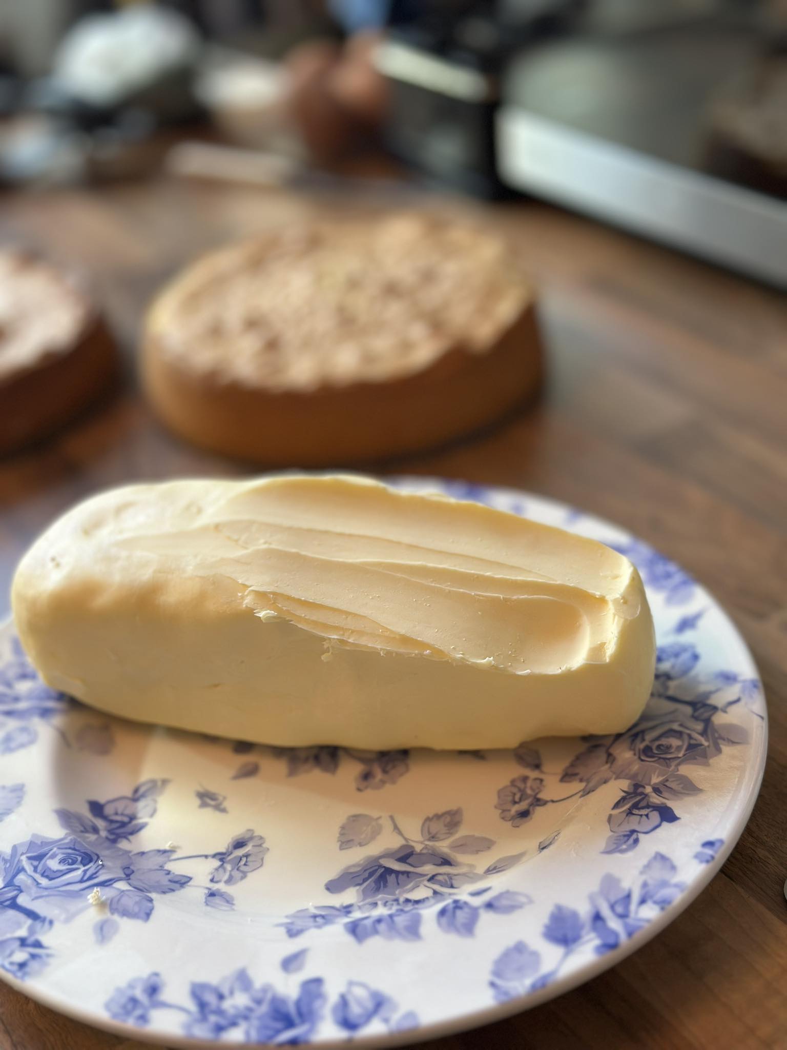 Fresh butter and cake layers in the kitchen