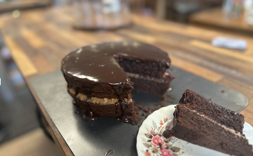 Chocolate cake with ganache glaze at The Vintage Vault bakery in Sheerness